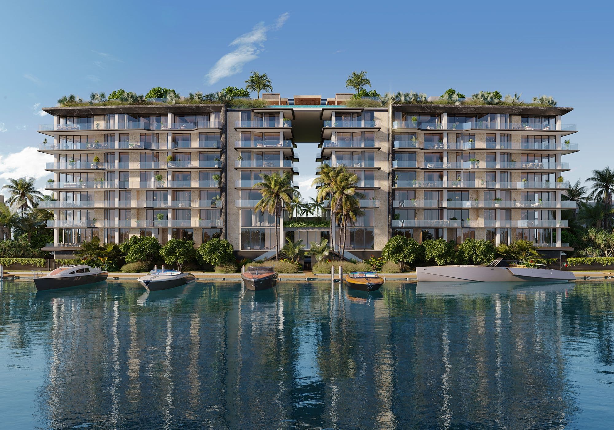 The 8-story building and its private marina, seen from the water