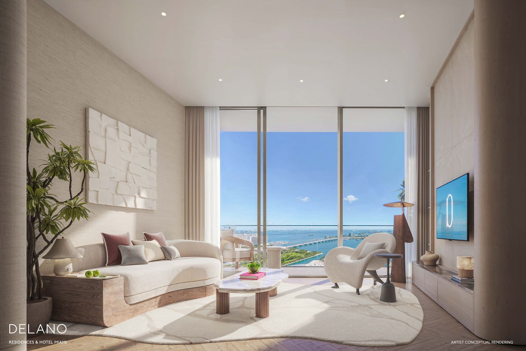 Living room of a D Collection residence, with bay views
