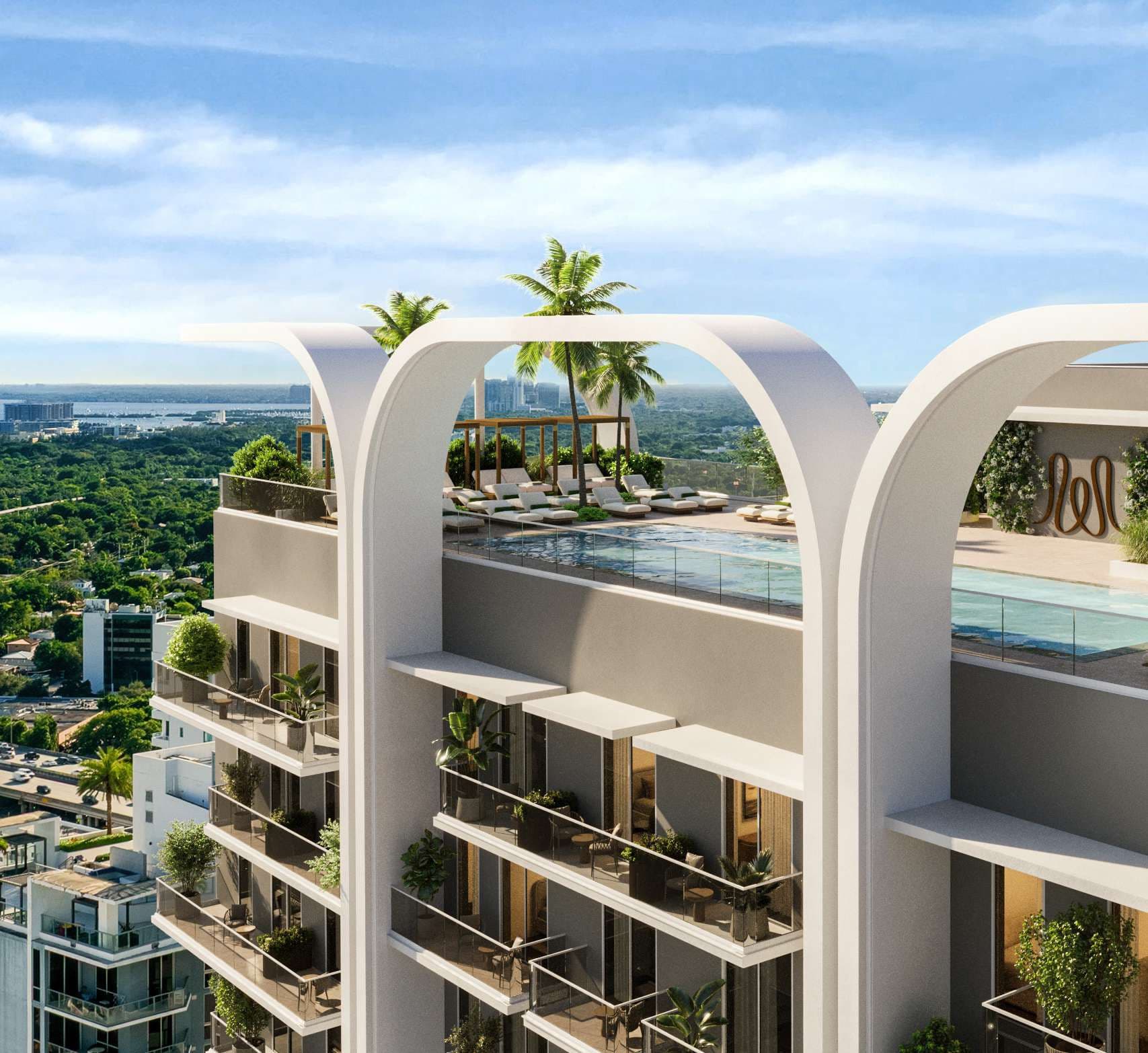 Rooftop pool framed by the arches